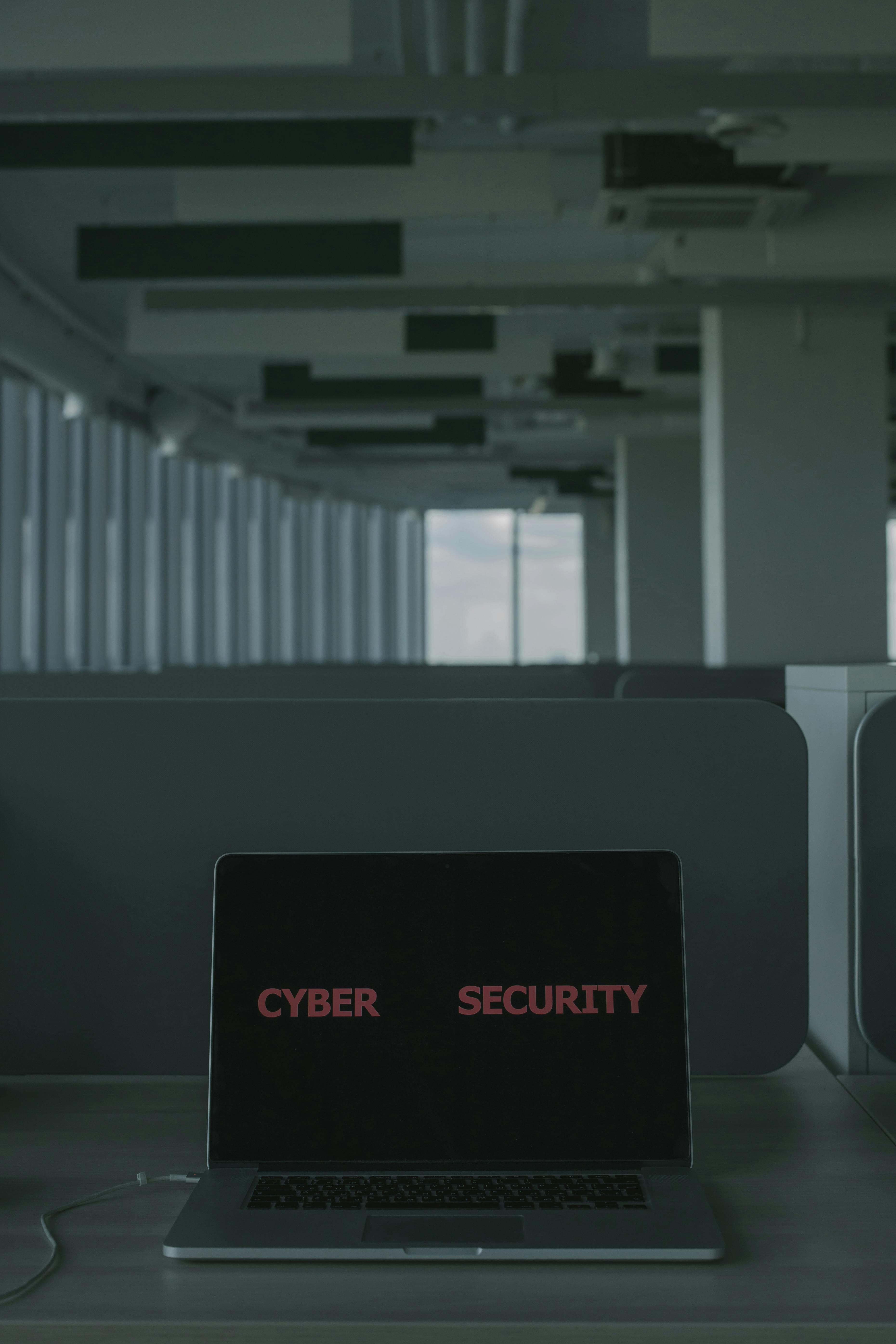 Laptop showing a cybersecurity work surface used for an article about AI-assisted patch validation